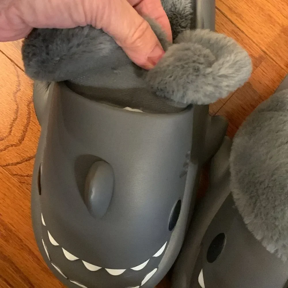 Shark furry (one pair) house slippers.  I have three Size 36-37